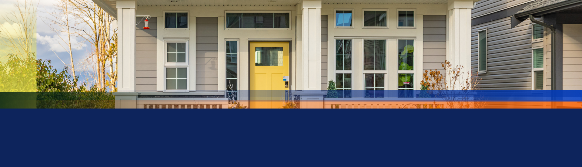 Residential home with a yellow door.